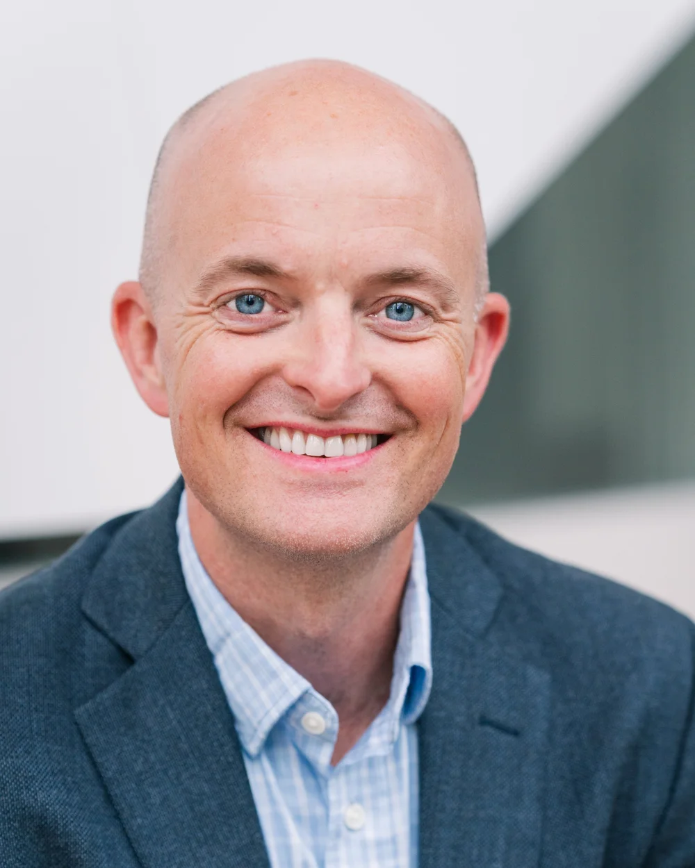 Headshot of Trevor J. Brock